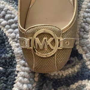Michael Kors gold flats